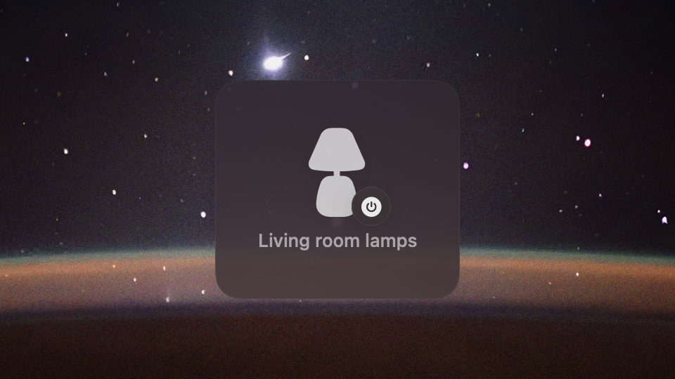 A square glass card with a table lamp icon, a power badge and the label Living room lamps.