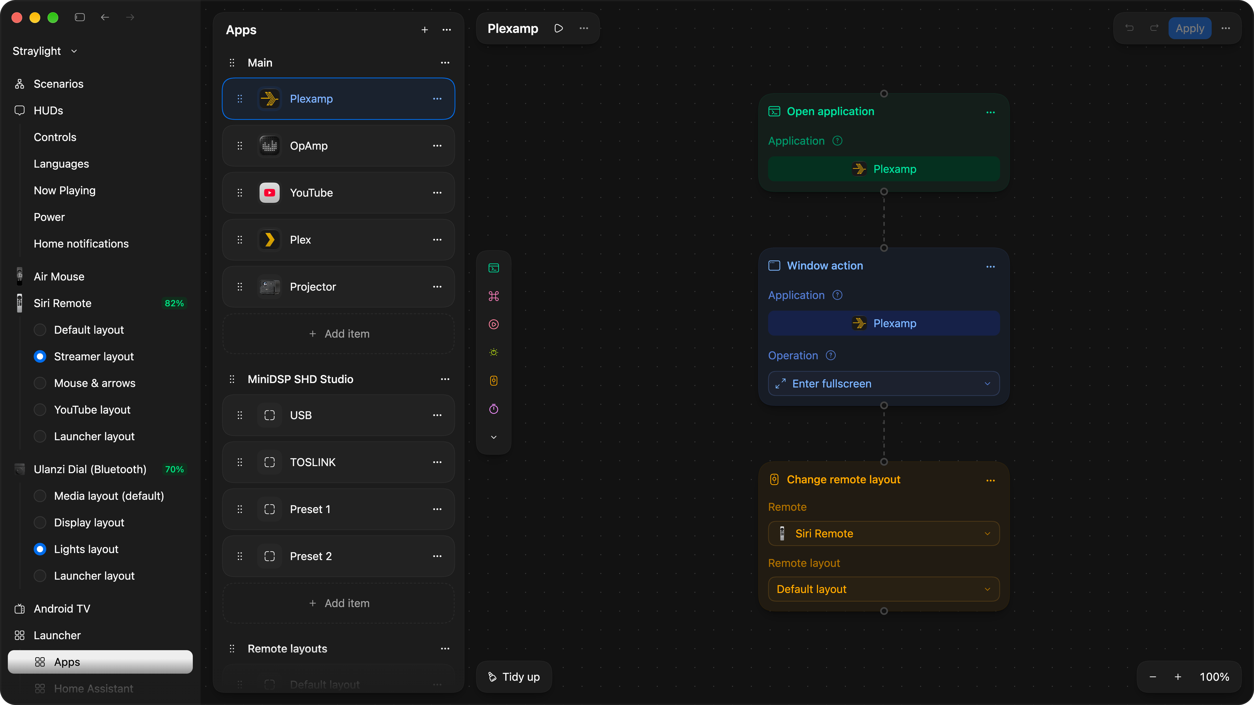 The editor with the Launcher's Apps section open: a panel listing its rows, Main with Plexamp, OpAmp, YouTube, Plex and Projector, MiniDSP SHD Studio with USB, TOSLINK and two presets, and Remote layouts; Plexamp is selected, and its scenario on the canvas is a green Open application card for Plexamp, a blue Window action card entering fullscreen and an orange Change remote layout card switching the Siri Remote to its Default layout.
