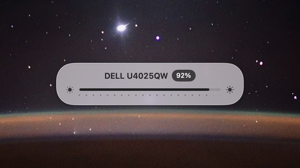 A light pink glass HUD over a starry sky and the glowing edge of the Earth, reading DELL U4025QW and 92%, with a brightness bar between two sun icons.