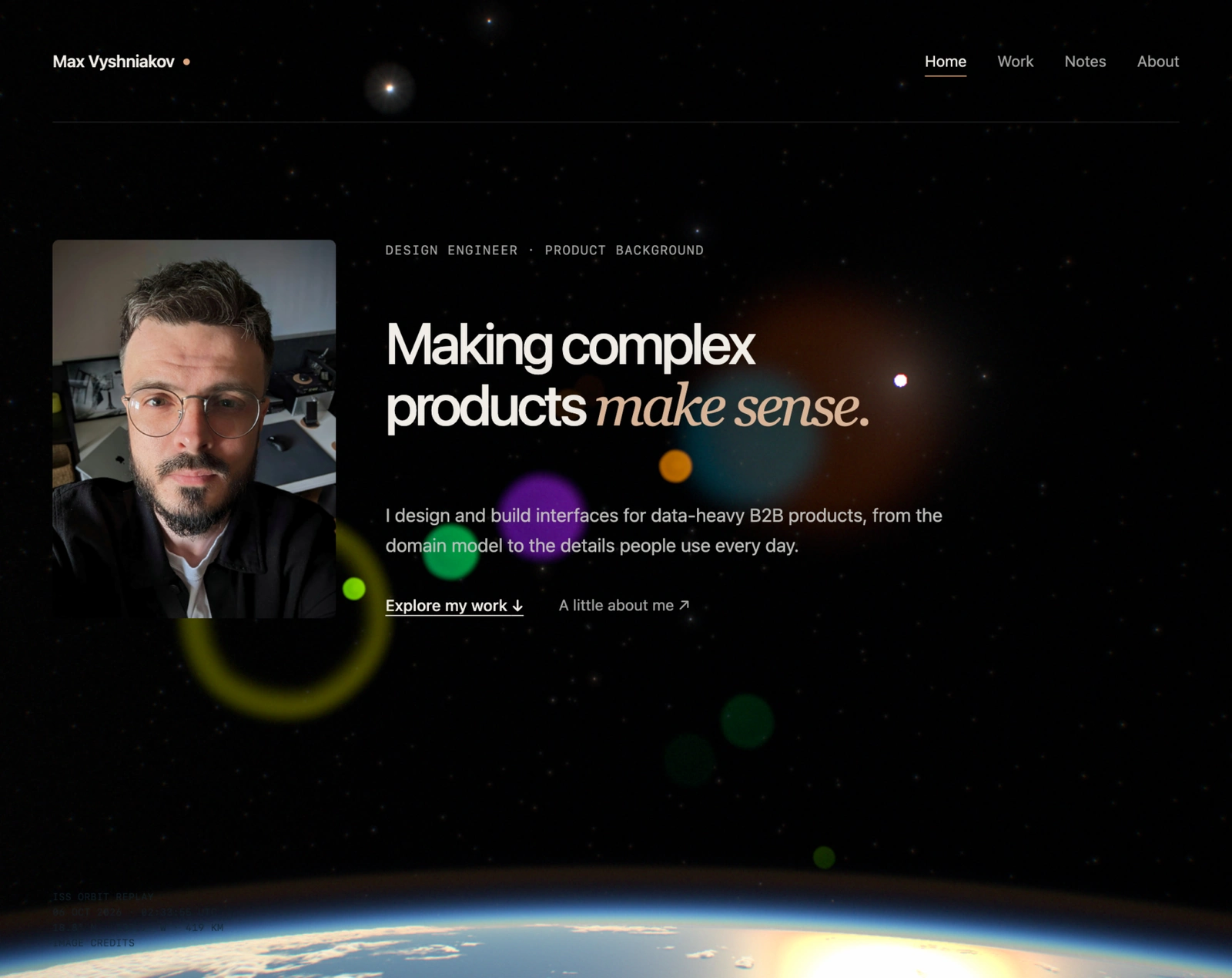 The homepage with a small dim Sun, large colored lens reflections over the text and a bright ocean below.